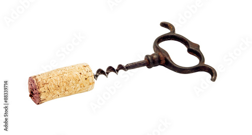 Old corkscrew with cork