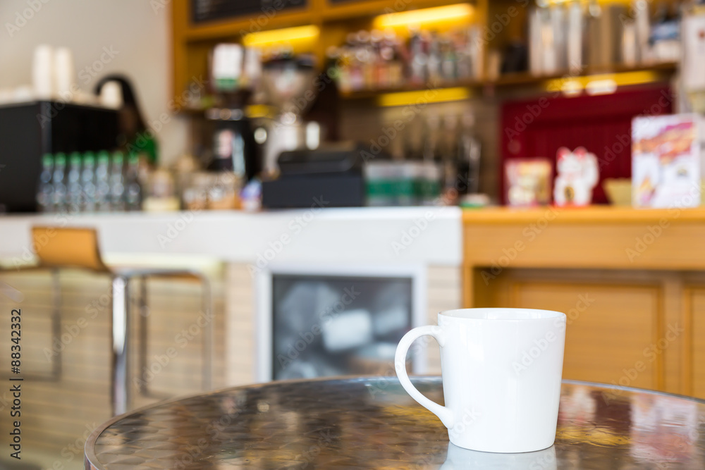 Coffee cup on table in cafe