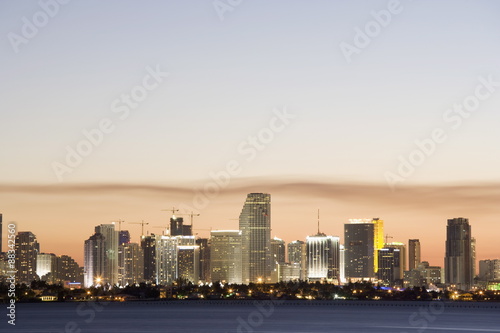 Miami downtown skyline at dusk, viewed from Julia Tuttle causeway, Miami, Florida photo