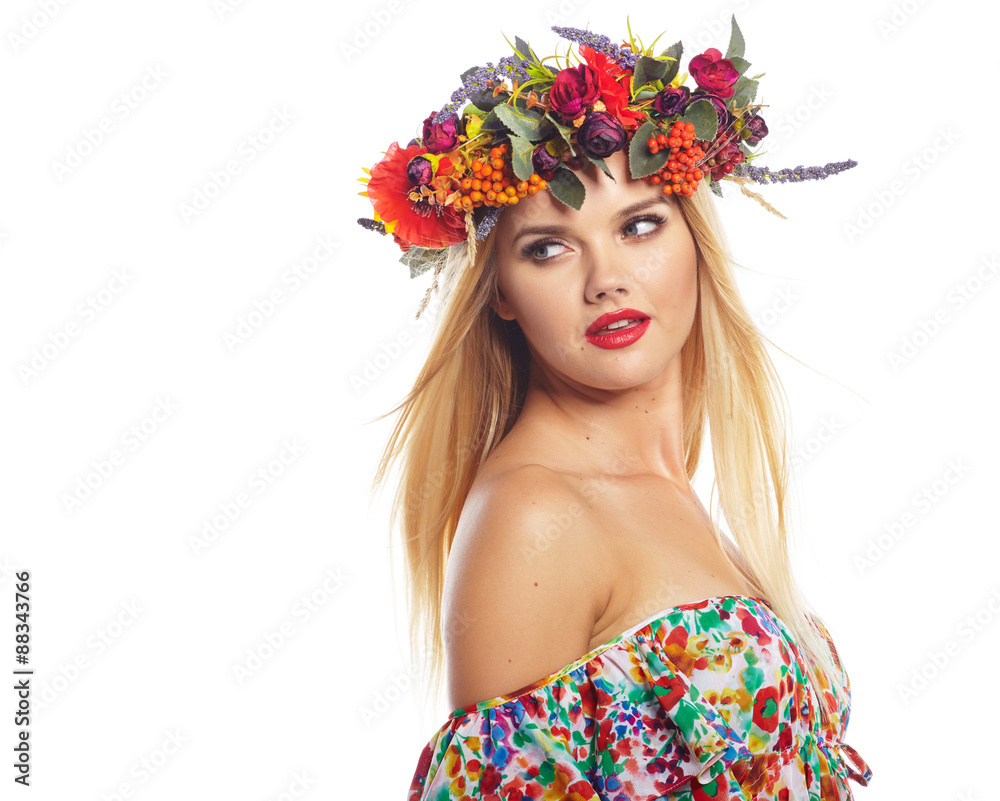 Naklejka premium Slavic blonde girl in the flowers wreath