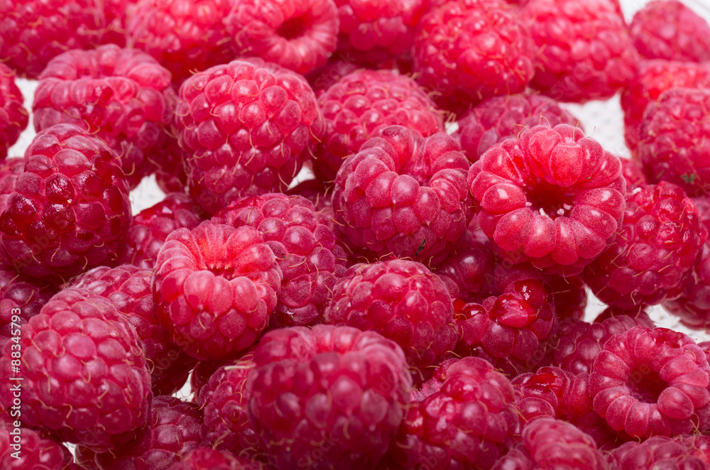A beautiful selection of freshly picked ripe red raspberries. A beautiful selection of freshly picked ripe red raspberries.