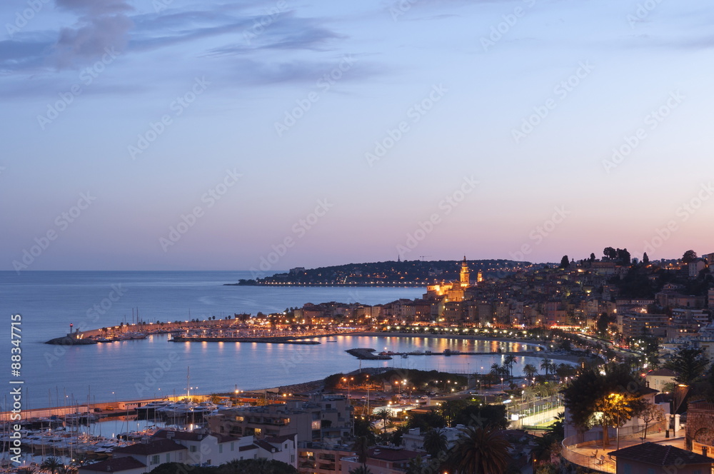 A cityscape of Menton at dusk, Provence-Alpes-Cote d'Azur, French Riviera, France, Mediterranean 