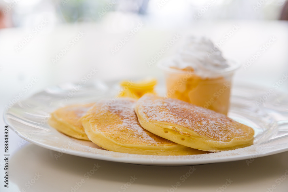 Pan cake with ice cream on table Pan cake with ice cream on table