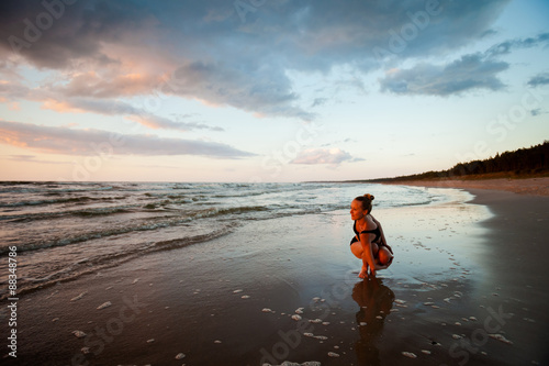 Beach yoga session by polish sea photo