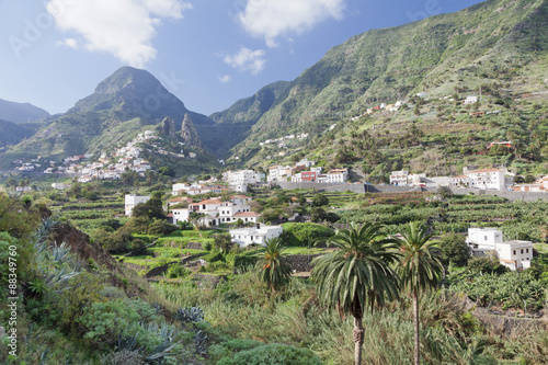 Hermigua, Roques de San Pedro Rock, terraecd fields, La Gomera, Canary Islands, Spain photo