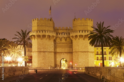 Torres de Serranos city gate at dusk, Valencia, Comunidad Valencia, Spain  photo