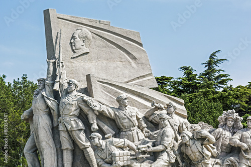 Idealized statue of socialist workers located next to Mao's Museum, Tiananmen Square, Beijing, China
