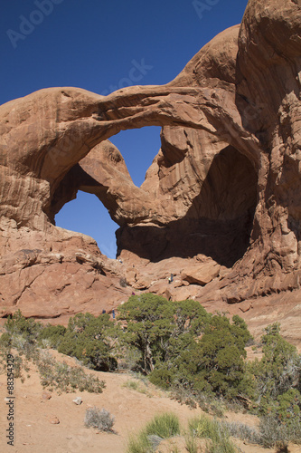 Erosion has formed natural stone arches, here two arches called Double Arch.Arches National Park, Utah