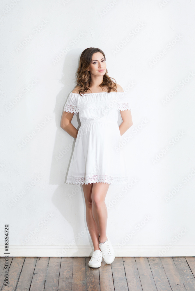 Beautiful pregnant woman on white background. Beautiful pregnant woman on white background.