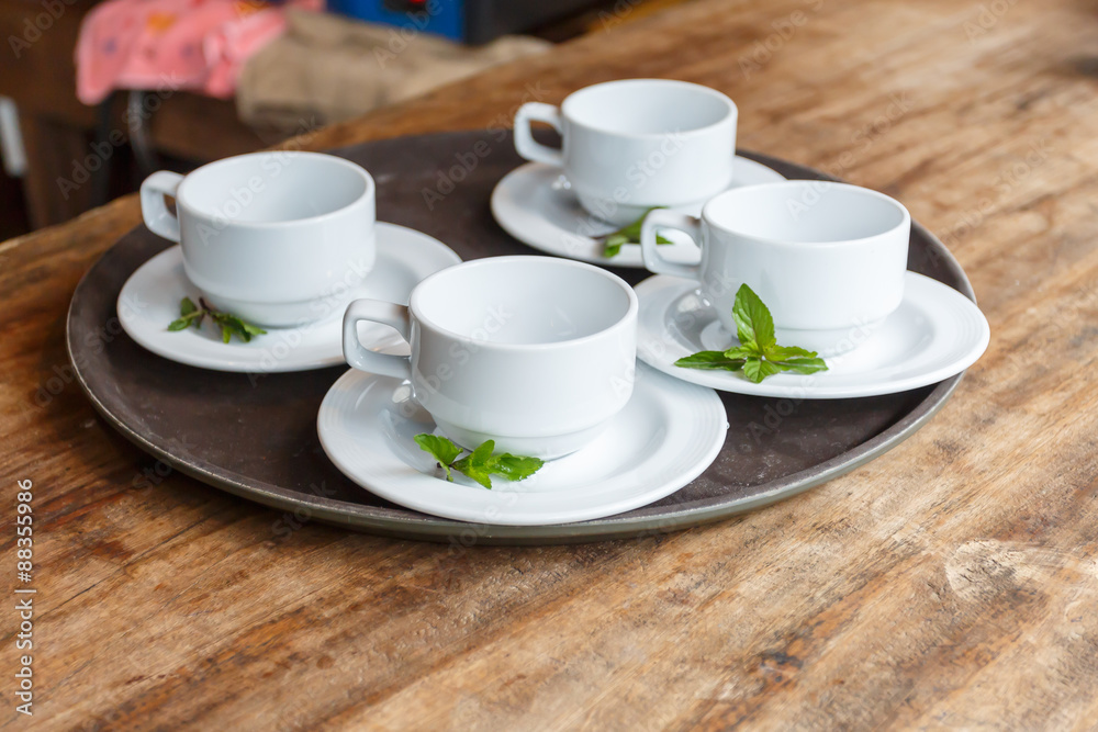 Empty coffee cupon wooden table Empty coffee cupon wooden table