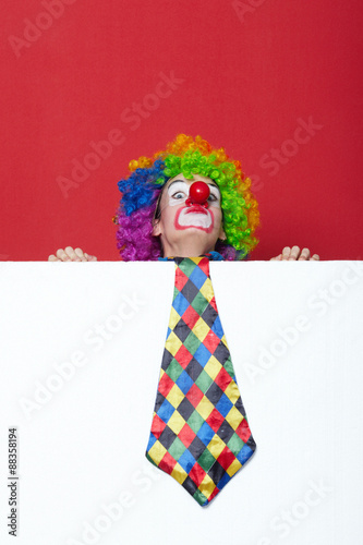 clown with tie on blank white board