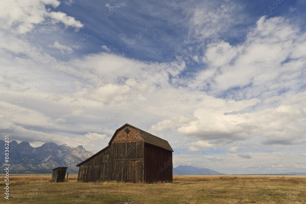 Mormon Row barn under a big sky in autumn (fall), Antelope Flats, Grand Teton National Park, Wyoming Mormon Row barn under a big sky in autumn (fall), Antelope Flats, Grand Teton National Park, Wyoming