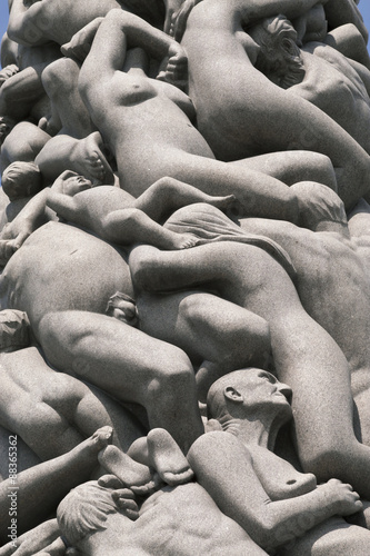 Intertwined human figures, detail of the Monolith by Gustav Vigeland, Frogner Park, Oslo photo