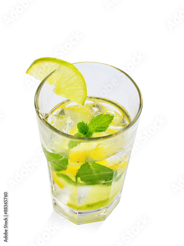 Glass of ice-cold mojito isolated