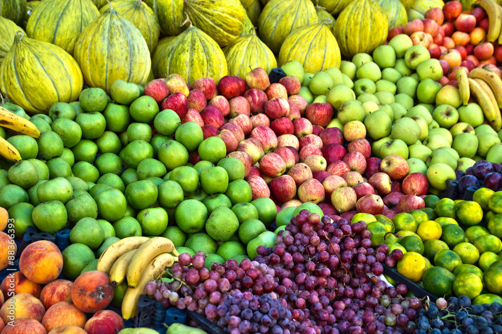 Variety of fresh organic fruits on the street stall Variety of fresh organic fruits on the street stall