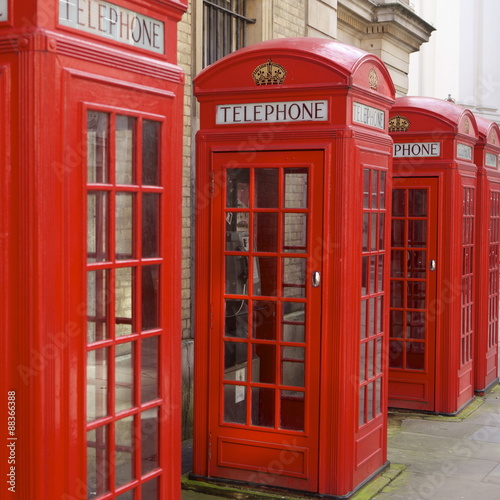 Row of red telephone booths design by Sir Giles Gilbert Scott, near Covent Garden, London  photo