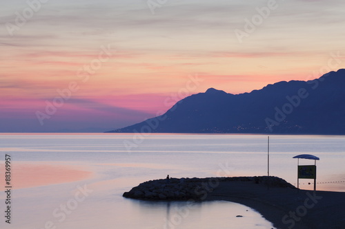 Sunset at the beach of Baska Voda, Makarska Riviera, Dalmatia, Croatia photo