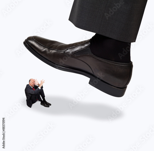 Giant foot about to step on a person