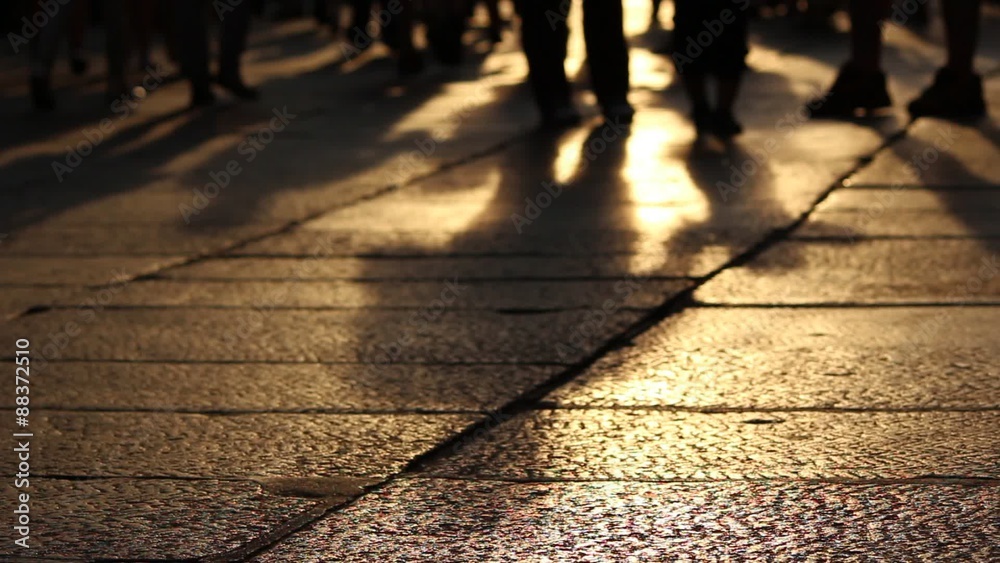 Legs and shadows on the streets