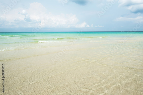 Shallow beach with clear and clean water at Koh Chang Island in Thailand