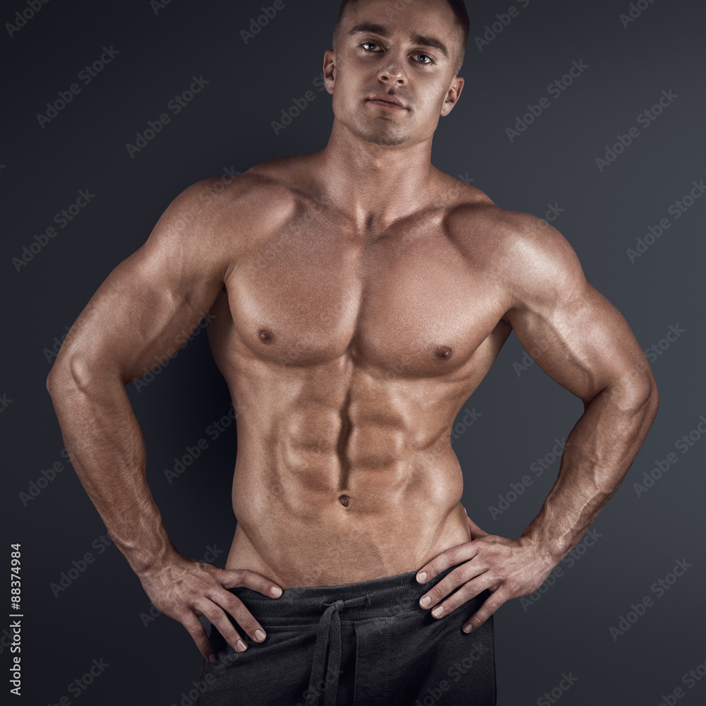 Muscular man in dark background