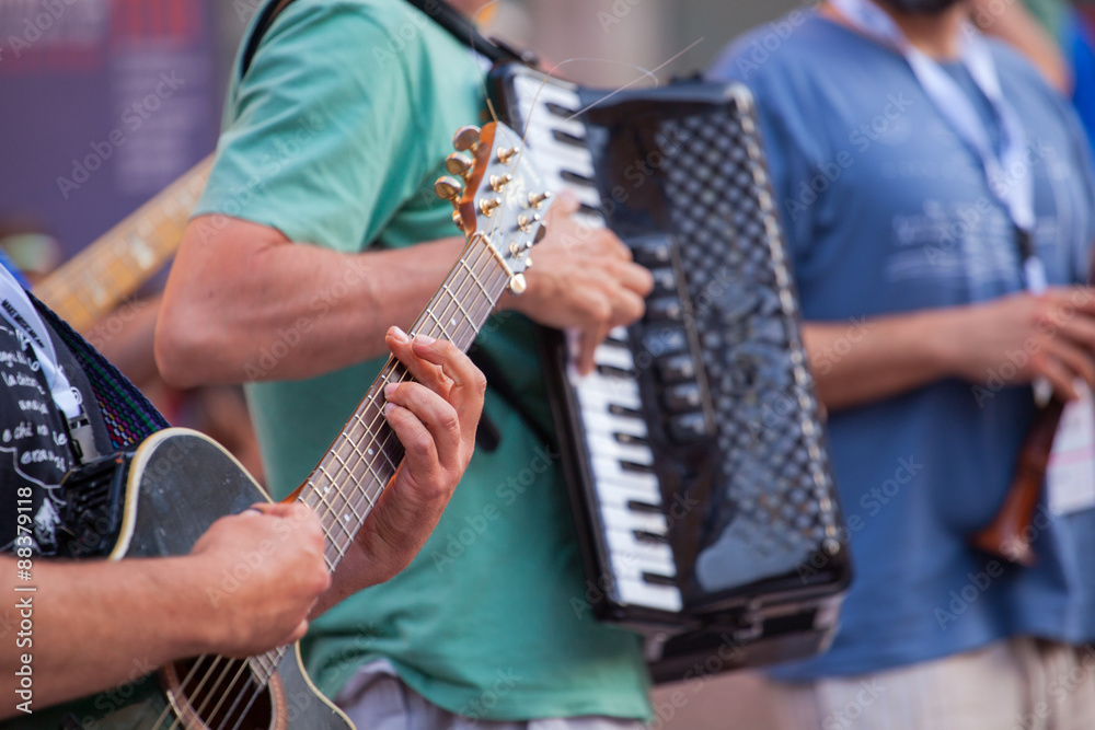 Fototapeta premium Guitar player during the street concert