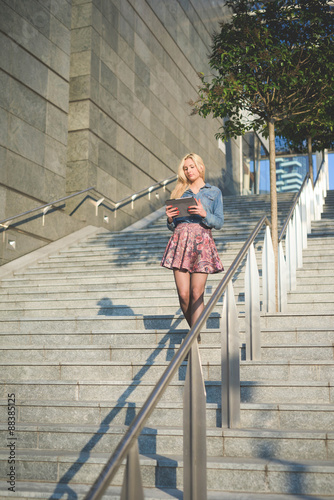 Young beautiful caucasian blonde girl in the city © Eugenio Marongiu