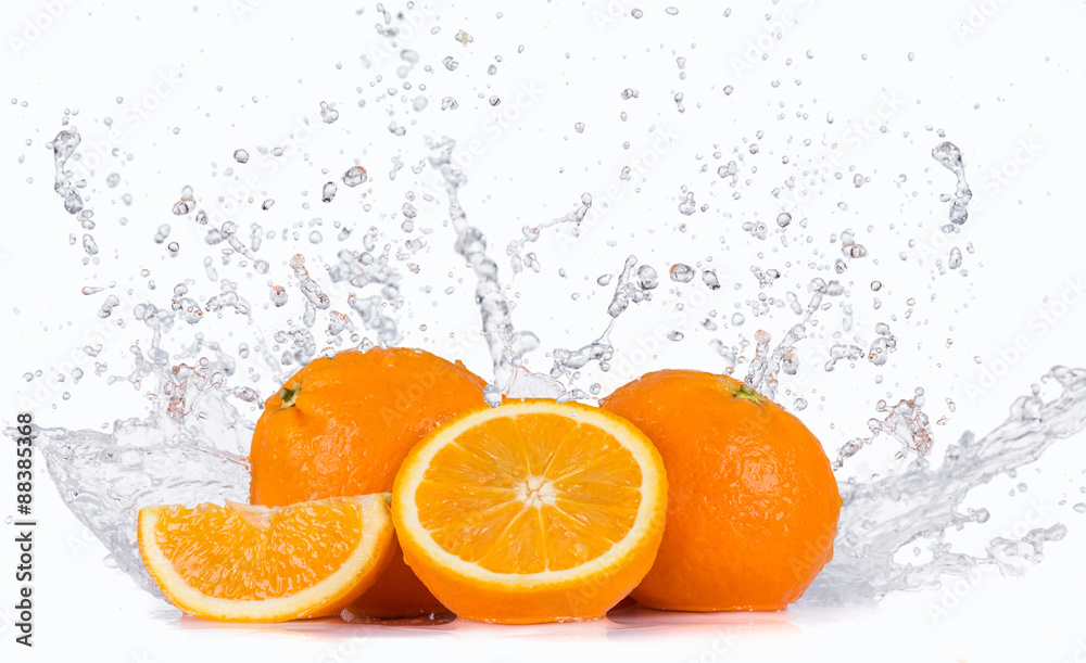 Fresh oranges with water splashes. Fresh oranges with water splashes.