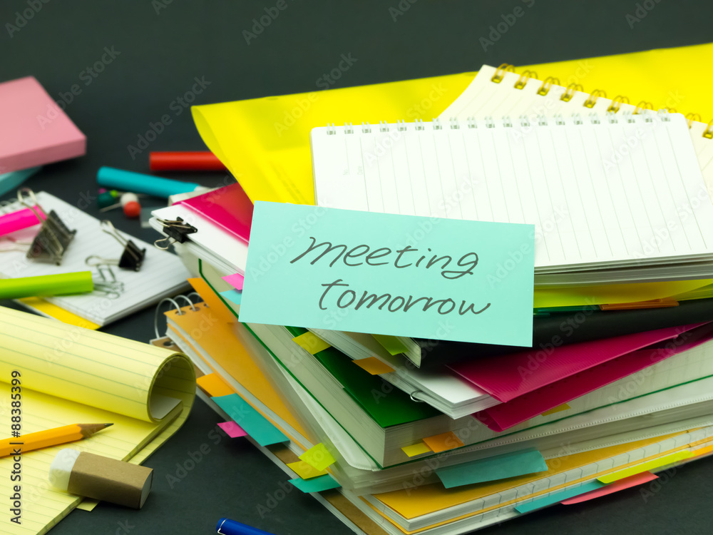 The Pile of Business Documents; Meeting Tomorrow