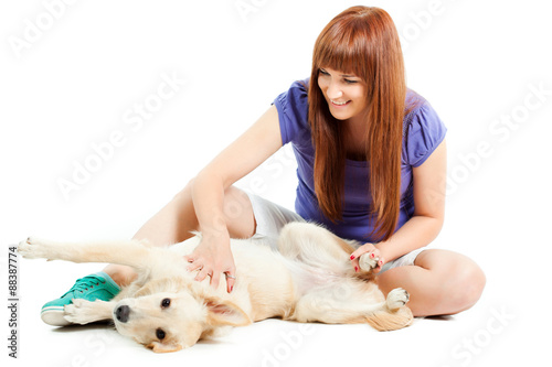 Woman having fun with her dog photo