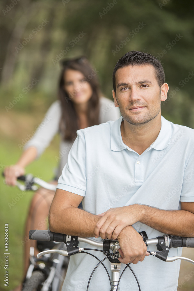 young couple cycling