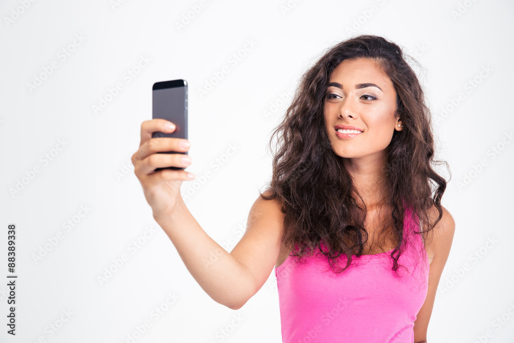 Woman making selfie photo on smartphone Woman making selfie photo on smartphone