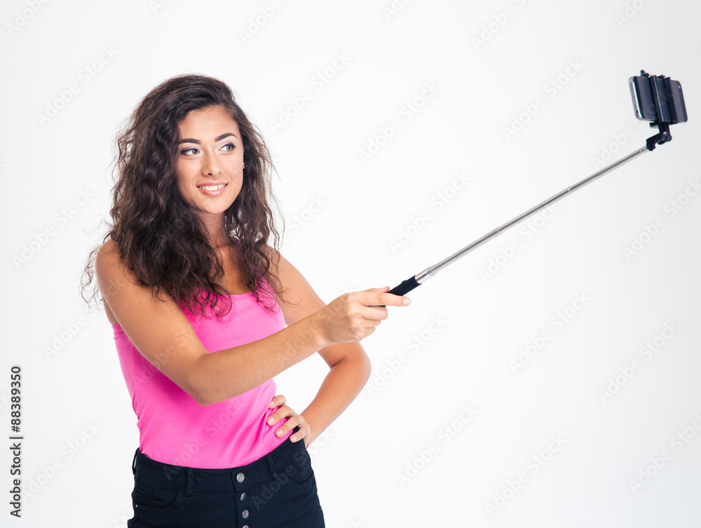 Smiling young woman making selfie photo Smiling young woman making selfie photo