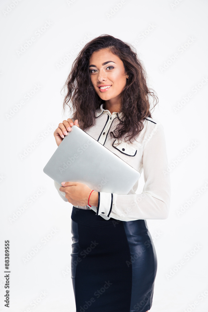 Portrait of a smiling businesswoman holding laptop Portrait of a smiling businesswoman holding laptop