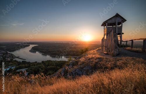 Wooden Tourist Observation Tower above a Little City with River