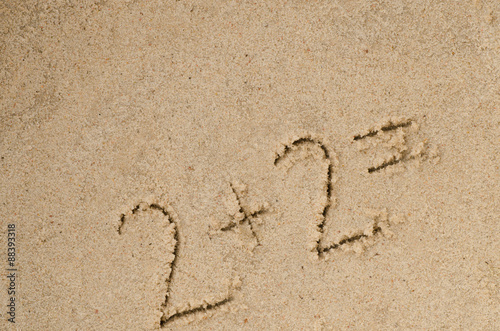 hanwritten numbers on sand © aga7ta