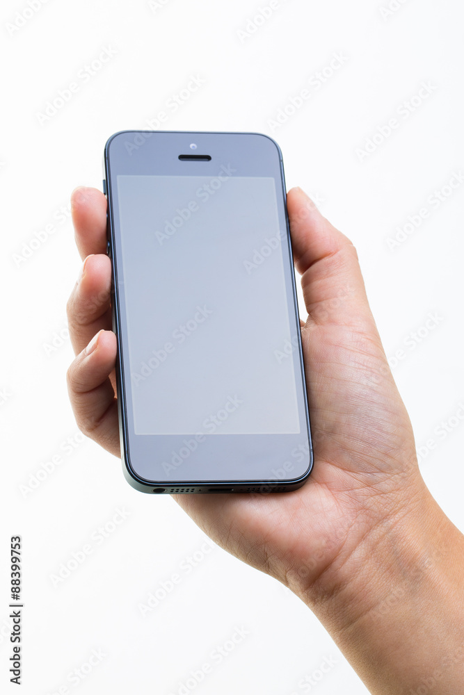 Female hand holding a smart phone, isolated on white Female hand holding a smart phone, isolated on white