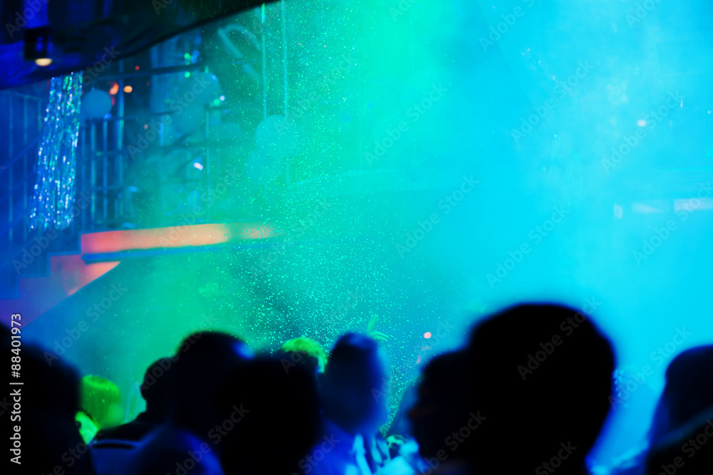 Obraz premium A party in a night club with falling snow