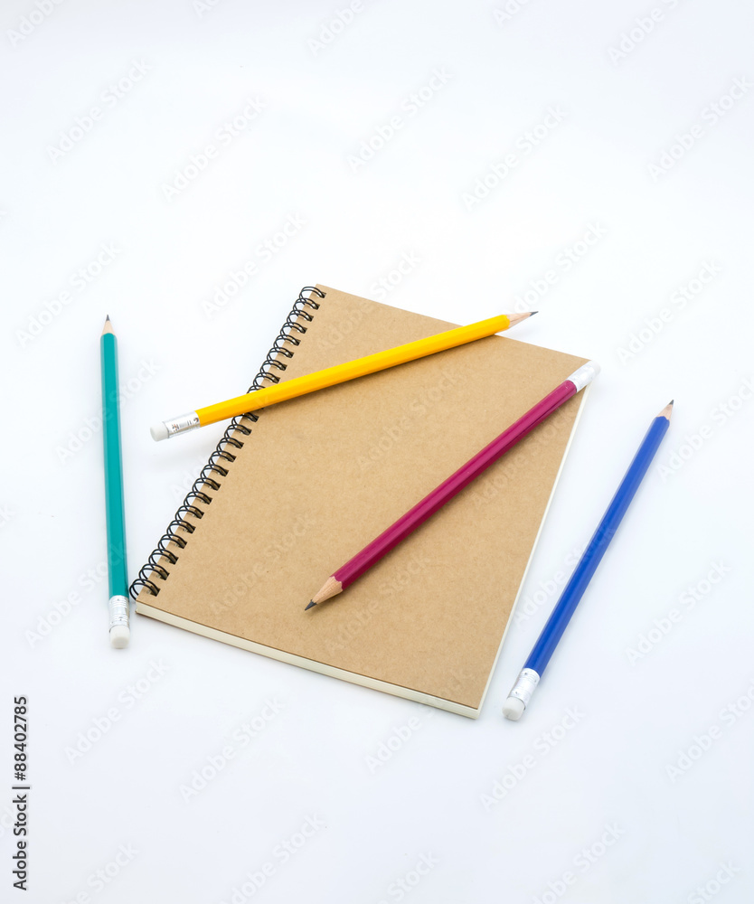 pencil and notebook on white background pencil and notebook on white background