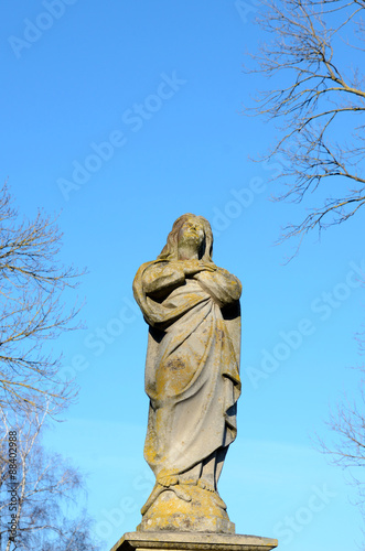 The statue in the old cemetery in Ukraine (good and evil, tempta