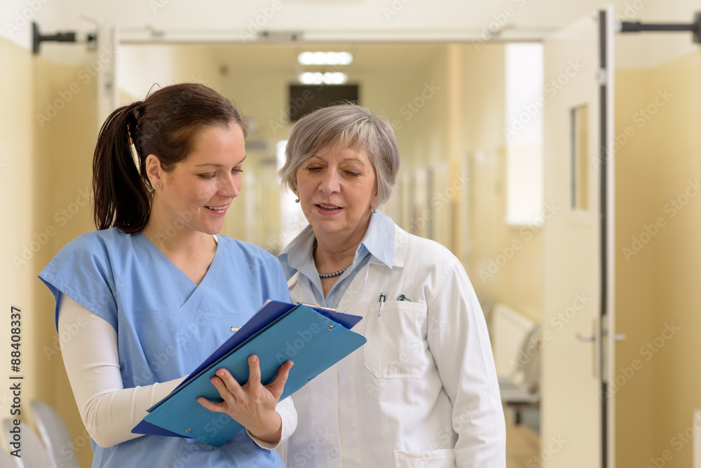 Nurse with doctor in hospital