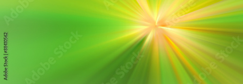 Esplosione di luce gialla su sfondo verde