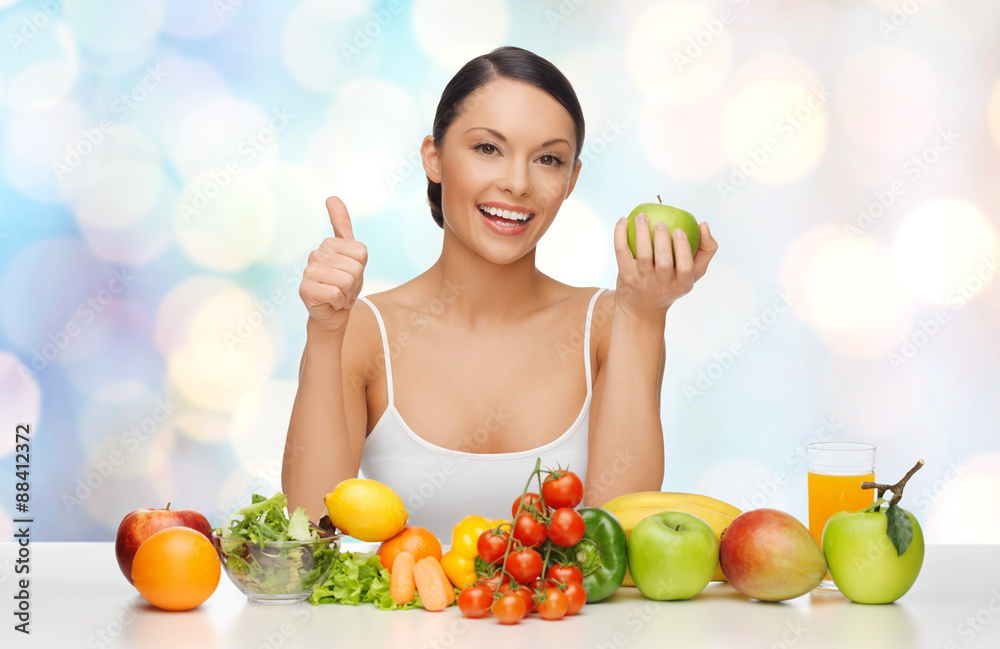 happy woman with healthy food showing thumbs up happy woman with healthy food showing thumbs up