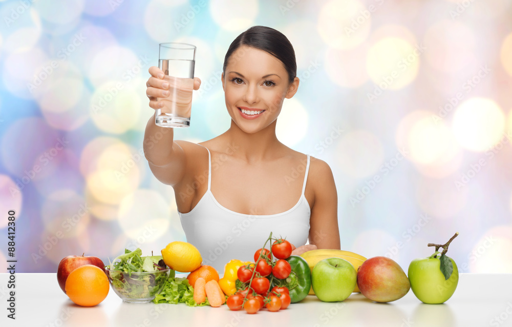happy woman with healthy food showing water glass happy woman with healthy food showing water glass