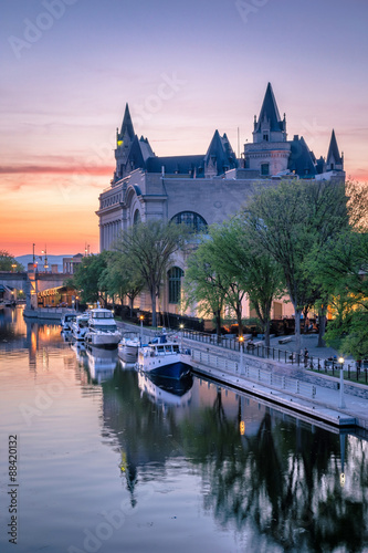 View of Parliament buildings from Plaza Bridge Ottawa during sunset photo