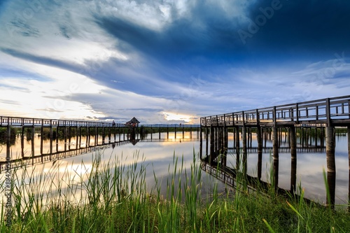 Wooden bridge cross around marsh in sunset time at Sam Roi Yot National Park Thailand