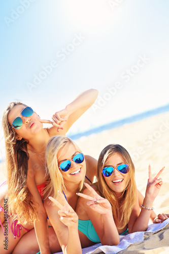 Photography Group of women having fun on the beach