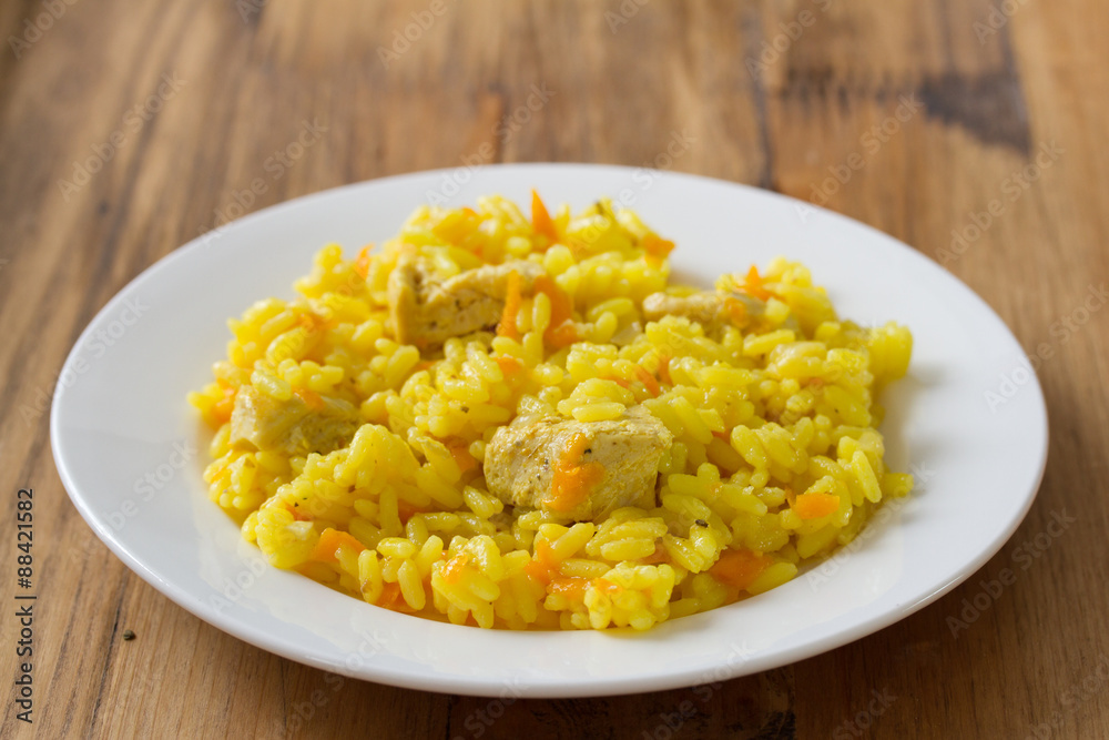 rice with meat and carrot on white plate rice with meat and carrot on white plate