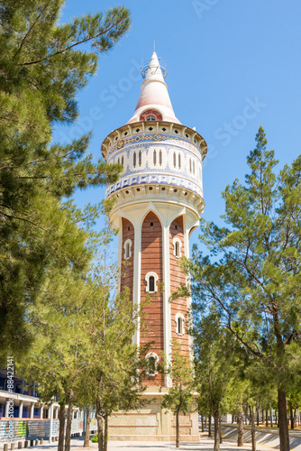 The restored water tower Torre d'aigües de la Catalana de Gas from 1905 in the Barcelona district Barceloneta, designed by Josep Domenech i Estapa. The tower has beautiful moorish elements photo