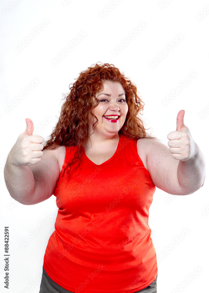 the fat beautiful woman with in red gesturing with his hands isolates on the white background the fat beautiful woman with in red gesturing with his hands isolates on the white background